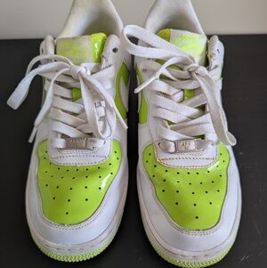 Nike Women's White Sneakers with Neon Green Accents
